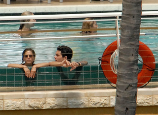 Illustration for article titled Jennifer & John Tread Water; Johnny Depp Flies Fancy